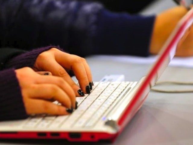 students of ict colleges who had applied for the gadgets were awarded laptops in a ceremony on wednesday photo express file