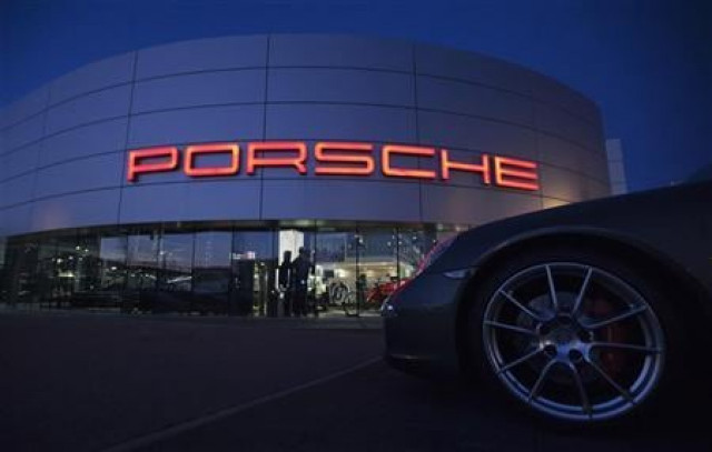 an illuminated porsche logo is pictured on a building of a porsche retail centre in niederwangen photo reuters an illuminated porsche logo is pictured on a building of a porsche retail centre in niederwangen photo reuters