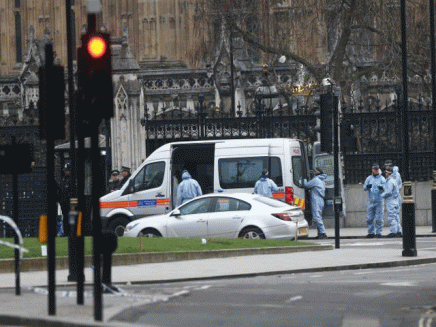 police work at carriage gate outside the houses of parliament photo reuters file