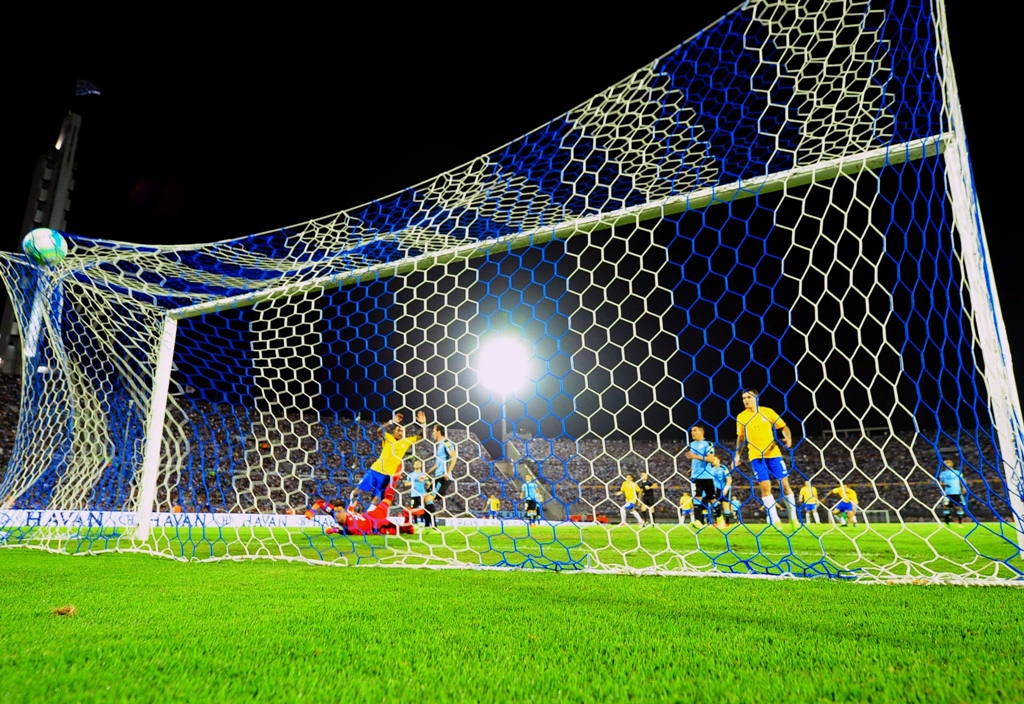 in form a superb hat trick from china based midfielder paulinho powered brazil to a 4 1 drubbing of the uruguayans in montevideo to leave the five time world champions all but certain of a place at next year 039 s finals in russia photo afp