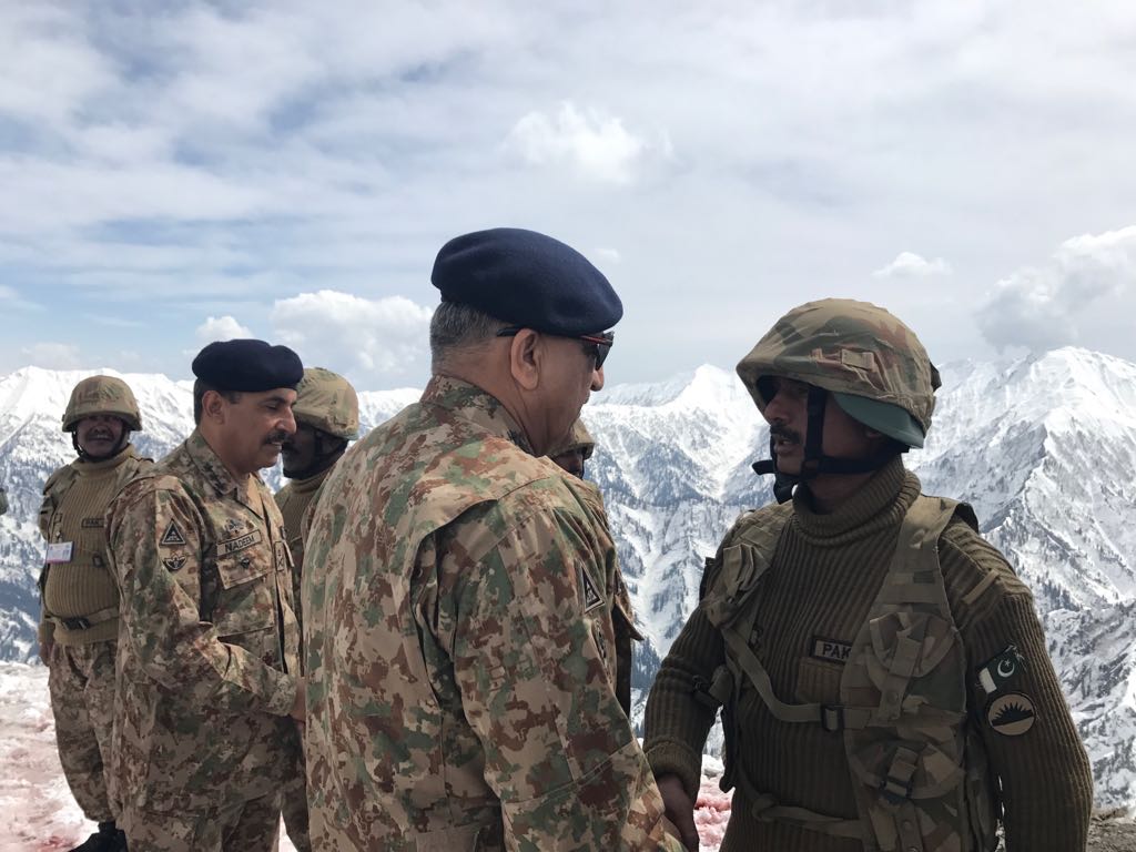 army chief general qamar bajwa meets troops at the line of control on friday photo ispr