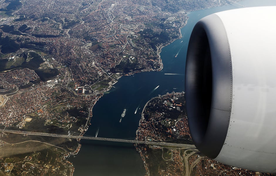 bosphorus strait and the fatih sultan mehmet bridge are pictured through the window of a passenger aircraft over istanbul turkey turkey photo reuters