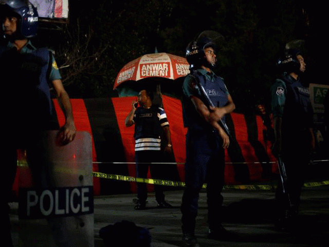 a security personnel talks over a walky talky while others stand guard in front of the spot where a suicide bomber blew himself up near the shahjalal international airport in dhaka bangladesh march 24 2017 photo reuters a security personnel talks over a walky talky while others stand guard in front of the spot where a suicide bomber blew himself up near the shahjalal international airport in dhaka bangladesh march 24 2017 photo reuters