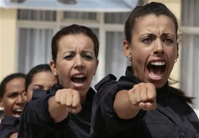 female police cadets perform during their graduation ceremony at the police academy in ain benian august 6 2009 photo reuters female police cadets perform during their graduation ceremony at the police academy in ain benian august 6 2009 photo reuters