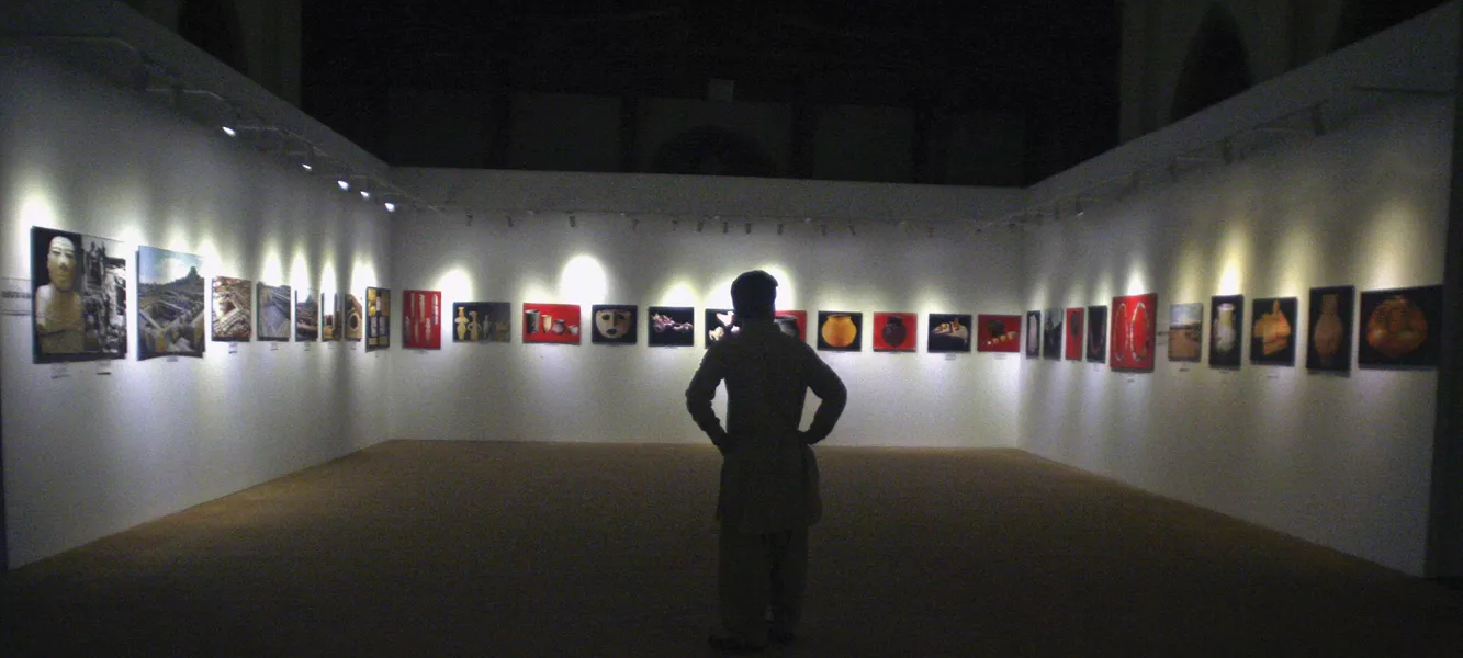 a visitor at the first day of the three day photo exhibition of 90 heritage sites takes a journey through an exceptional mosaic of culture and history photo athar khan express a visitor at the first day of the three day photo exhibition of 90 heritage sites takes a journey through an exceptional mosaic of culture and history photo athar khan express