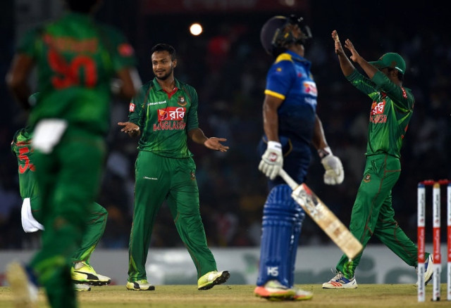 bangladesh cricketer shakib al hasan 2ndl celebrates with teammates after he dismissed sri lankan cricketer asela gunaratne 2ndr during the first one day international odi cricket match between sri lanka and bangladesh at the rangiri dambulla international cricket stadium in dambulla on march 25 2017 photo afp