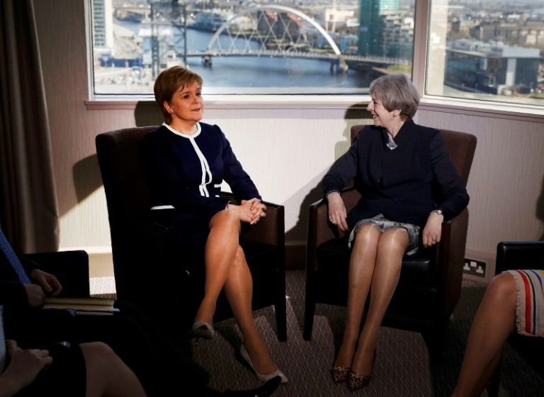 britain 039 s prime minister theresa may r and scotland 039 s first minister nicola sturgeon pose ahead of their meeting in a glasgow hotel on monday but their talks failed to bridge the divide over scottish independence photo afp