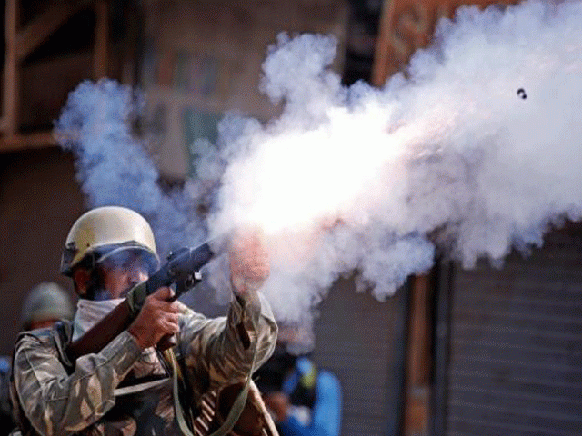 an indian policeman fires a teargas shell towards demonstrators during a protest against the recent killings in kashmir in srinagar september 13 2016 photo reuters an indian policeman fires a teargas shell towards demonstrators during a protest against the recent killings in kashmir in srinagar september 13 2016 photo reuters