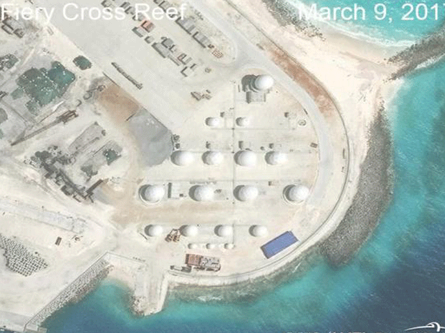 construction is shown on fiery cross reef in the spratly islands the disputed south china sea photo reuters