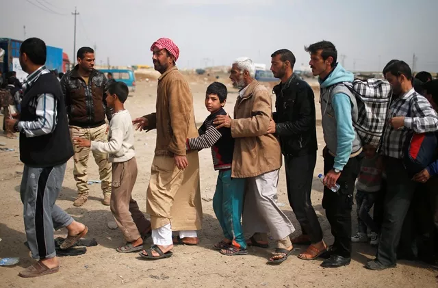 displaced residents who fled their homes wait to be searched by iraqi troops as iraqi forces battle with islamic state militants in western mosul iraq march 28 2017 photo reuters displaced residents who fled their homes wait to be searched by iraqi troops as iraqi forces battle with islamic state militants in western mosul iraq march 28 2017 photo reuters