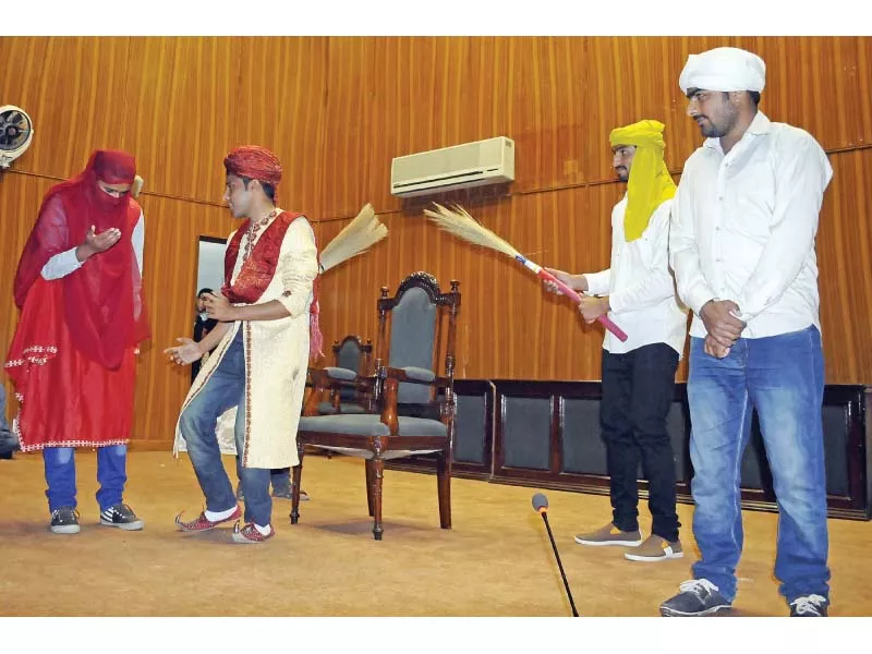 students of at pir mehr ali shah university present a drama photo zafar aslam express students of at pir mehr ali shah university present a drama photo zafar aslam express