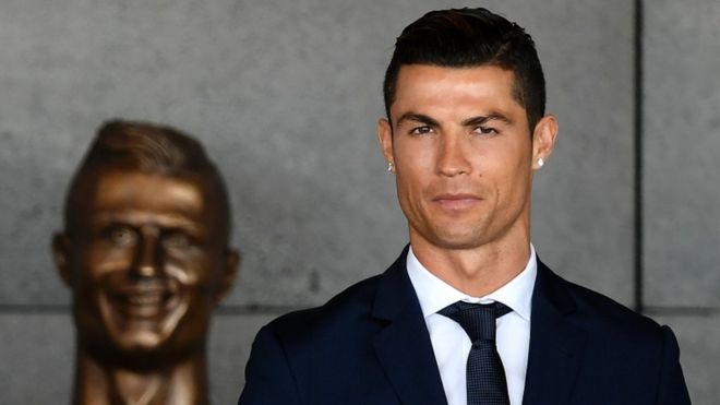 real madrid was presented a grinning bust but fans were quick to mock 039 statue as nothing like him and even horrifying 039 photo afp