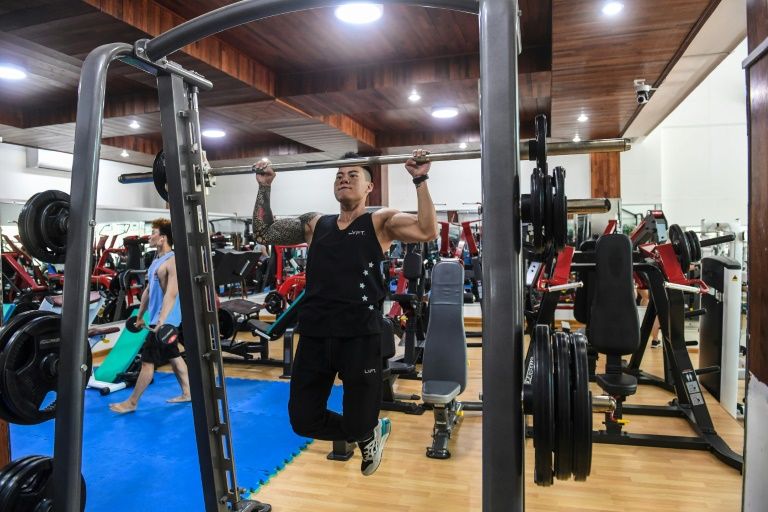 vietnamese transgender bodybuilder kendy nguyen works out at a gym in ho chi minh city photo afp