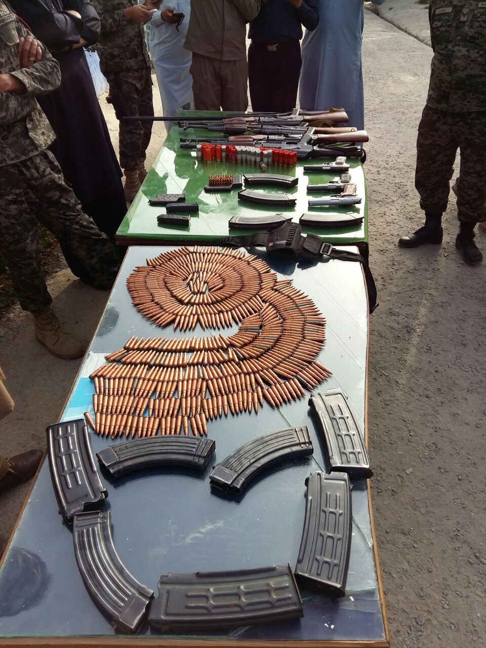 the arms cache seized during fresh raids across punjab on thursday photo ispr