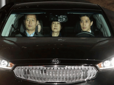 ousted south korean leader behind bars after arrest on bribery charges