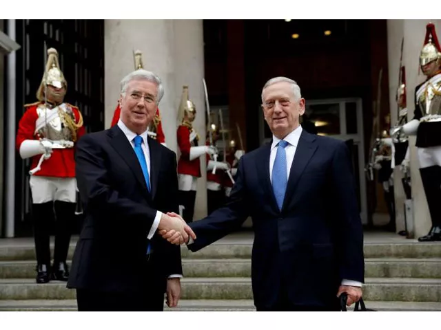 us defence secretary james mattis and britain 039 s defence secretary michael fallon pose for a handshake in front of a ceremonial guard of the household cavalry mounted regiment as mattis arrives for their meeting at the ministry of defence in london march 31 2017 photo reuters us defence secretary james mattis and britain 039 s defence secretary michael fallon pose for a handshake in front of a ceremonial guard of the household cavalry mounted regiment as mattis arrives for their meeting at the ministry of defence in london march 31 2017 photo reuters