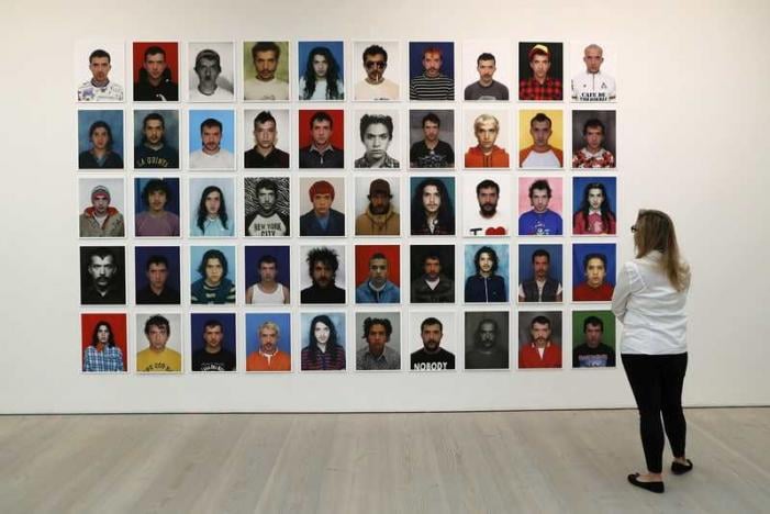 a woman looks at 039 miss fotojapon 1998 to present 039 by juan pablo echeverri during a press day to promote the upcoming exhibition 039 from selfie to self expression 039 at the saatchi gallery in london britain march 30 2017 reuters stefan wermuth