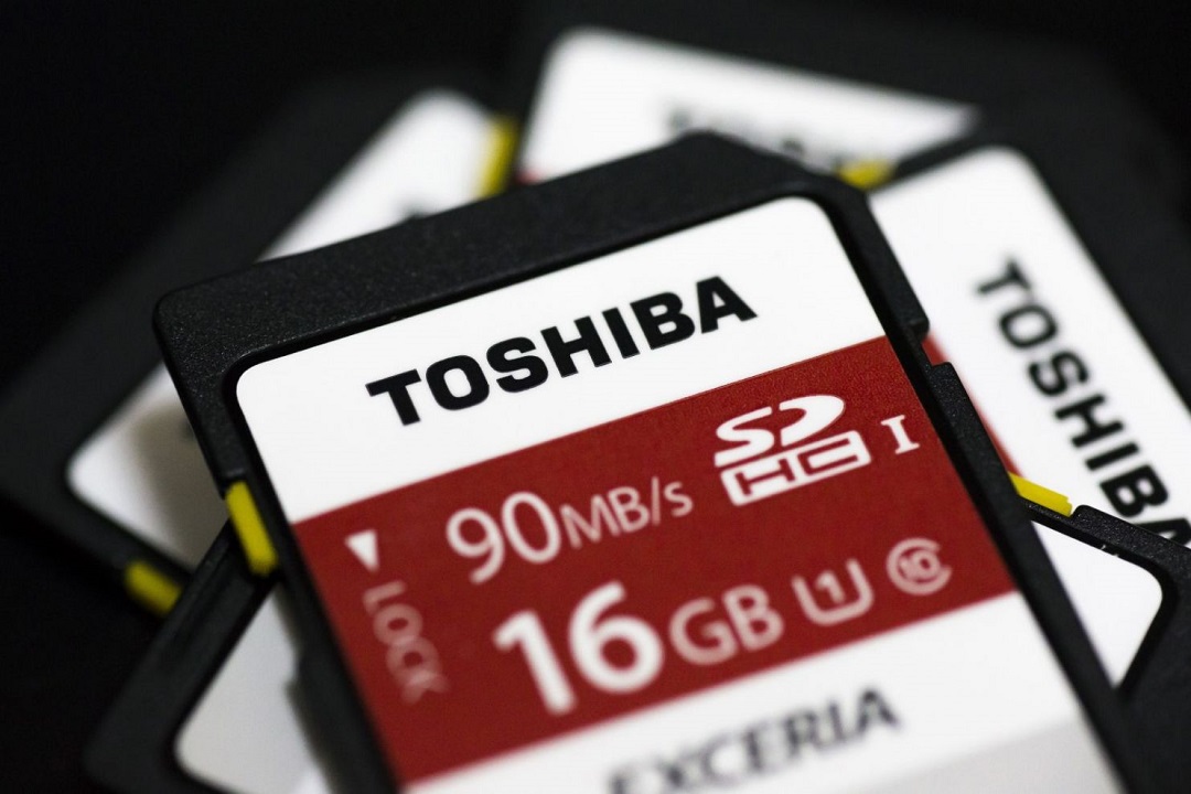 toshiba has reportedly completed the first round of bidding for its prized memory chip business photo afp