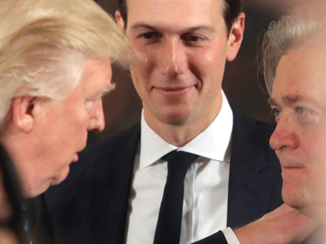 us president donald trump talks to senior staff steve bannon and jared kushner during a swearing in ceremony for senior staff at the white house in washington dc photo reuters