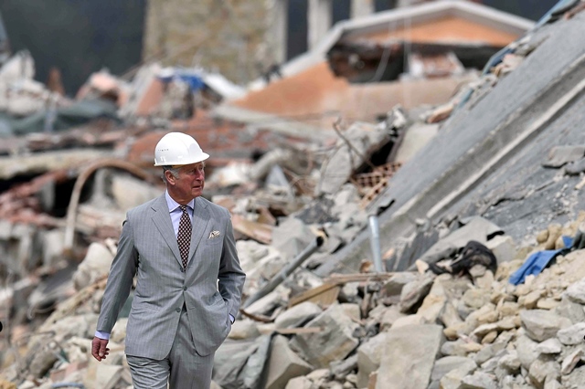 britain 039 s prince charles walks during his visit to the town of amatrice which was levelled after an earthquake last year in central italy april 2 2017 photo reuters