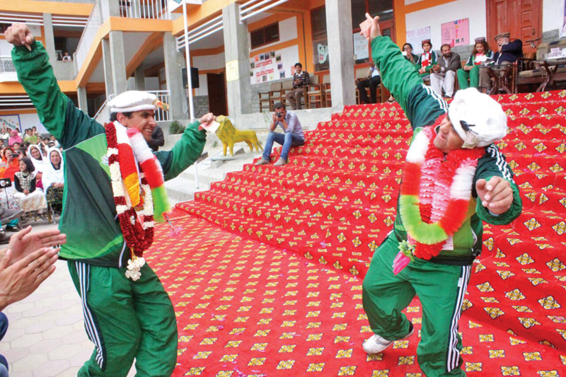 g b special athletes are garlanded and dance at their welcome ceremony photos express