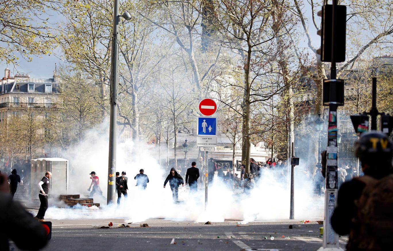 clouds of tear gas fill the place de la republique during clashes between french riot police and members of the chinese community photo reuters