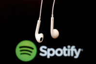 spotify to cut 1 500 jobs in third layoff round this year shares jump