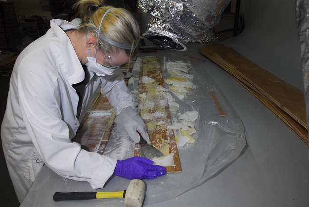 this undated handout photo released by the australian federal police on april 5 2017 shows crystal methamphetamine being removed from planks of wood at a warehouse in the victorian state suburb of nunawading east of melbourne where it was hidden in 70 boxes of floorboards shipped from china photo afp