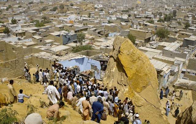 the ill fated house situated on a hill in gulshan e ghazi of the area was hit by a boulder at around 4am when the family was sleeping inside said baldia town sp asif razzak photo inp