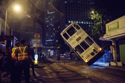 driver arrested after hong kong tram flips over injuring 14 driver arrested after hong kong tram flips over injuring 14