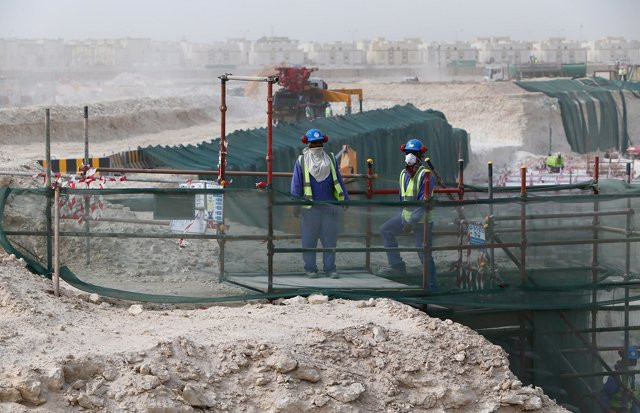 foreign laborers work at the construction site of the al wakrah football stadium one of the qatar 039 s 2022 world cup stadiums photo afp foreign laborers work at the construction site of the al wakrah football stadium one of the qatar 039 s 2022 world cup stadiums photo afp