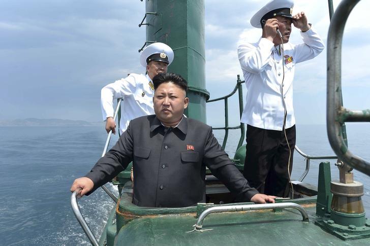 north korean leader kim jong un front stands on the conning tower of a submarine during his inspection of the korean people 039 s army kpa naval unit 167 in this undated photo released by north korea 039 s korean central news agency kcna in pyongyang photo reuters