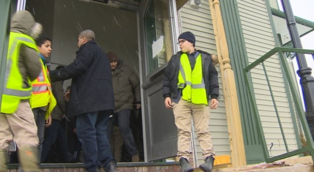 the 12 year old stands guard on the mosque doors during prayers photo cbc the 12 year old stands guard on the mosque doors during prayers photo cbc