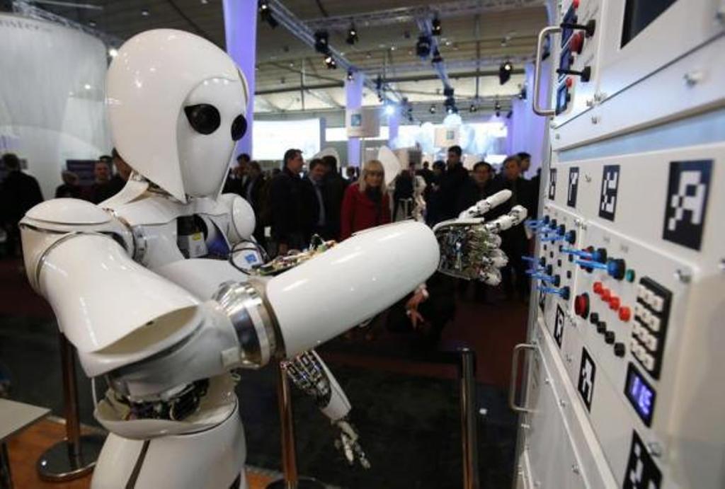 the humanoid robot aila artificial intelligence lightweight android operates a switchboard during a demonstration by the german research center for artificial intelligence at the cebit computer fair in hanover march 5 2013 photo reuters