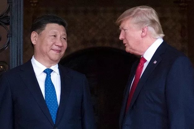 us president donald trump r welcomes chinese president xi jinping l to the mar a lago estate in west palm beach florida on april 6 2017 photo afp us president donald trump r welcomes chinese president xi jinping l to the mar a lago estate in west palm beach florida on april 6 2017 photo afp