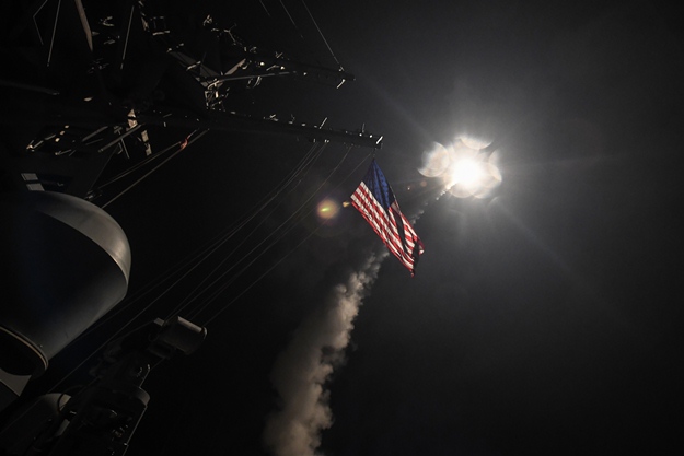 in this image released by the us navy the uss ross fires a tomahawk land attack missile april 7 2017 at a syrian air force airfield photo afp