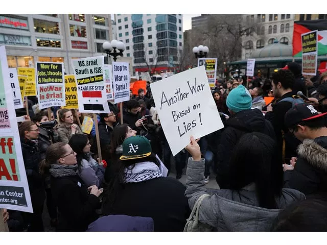 people participate in a protest against a recent american missile strike in syria in union square on april 7 2017 in new york united states photo afp people participate in a protest against a recent american missile strike in syria in union square on april 7 2017 in new york united states photo afp
