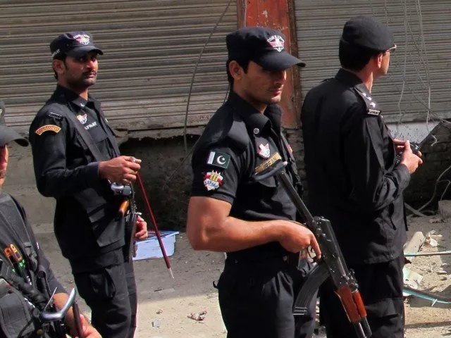 a file photo of police personnel in peshawar photo afp a file photo of police personnel in peshawar photo afp