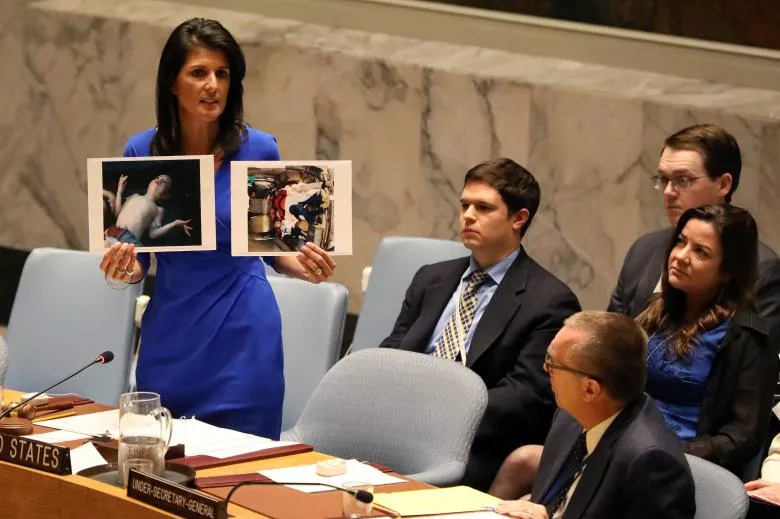 us ambassador to the united nations nikki haley holds photographs of victims during a meeting at the united nations security council on syria at the united nations headquarters in new york photo reuters us ambassador to the united nations nikki haley holds photographs of victims during a meeting at the united nations security council on syria at the united nations headquarters in new york photo reuters