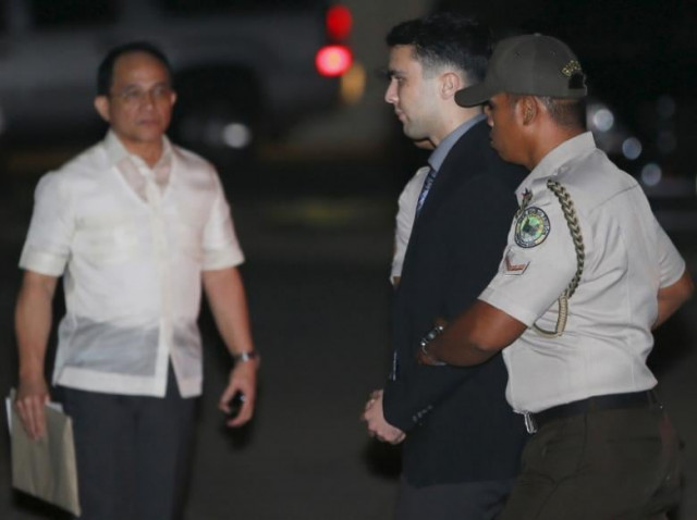 philippine bureau of corrections personnel escort u s marine lance corporal joseph scott pemberton c after he was found guilty by trial court of killing jennifer laude a transgender woman upon arrival in a detention facility at camp aguinaldo in quezon city metro manila photo reuters philippine bureau of corrections personnel escort u s marine lance corporal joseph scott pemberton c after he was found guilty by trial court of killing jennifer laude a transgender woman upon arrival in a detention facility at camp aguinaldo in quezon city metro manila photo reuters