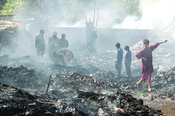 reduced to cinders the blaze was declared a third degree fire and a thick cloud of smoke emanating could be seen from a distance photo ayesha mir express reduced to cinders the blaze was declared a third degree fire and a thick cloud of smoke emanating could be seen from a distance photo ayesha mir express