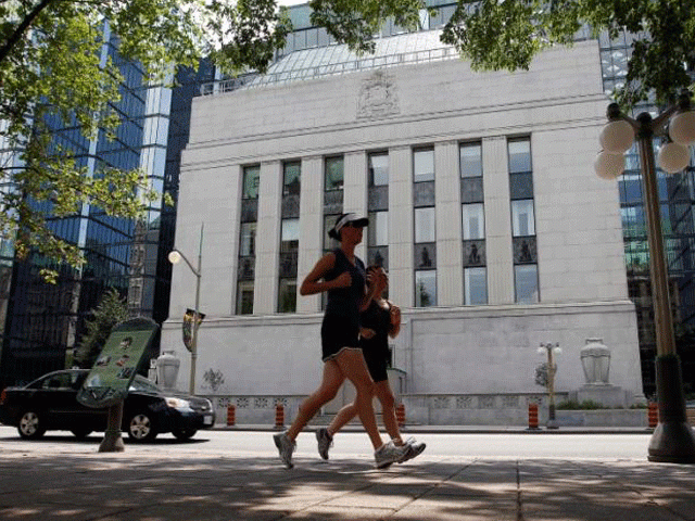 joggers run past the bank of canada building in ottawa july 17 2012 photo reuters joggers run past the bank of canada building in ottawa july 17 2012 photo reuters