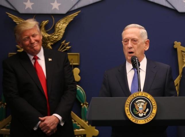 us president donald trump listens to remarks by defense secretary james mattis r after a swearing in ceremony for mattis at the pentagon in washington us photo reuters