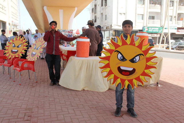 ocean welfare organization pakistan that also runs the footpath school under the bridge near abdullah shah ghazi 039 s mazar in clifton set up a heatwave camp at the same location on tuesday photo ayesha mir