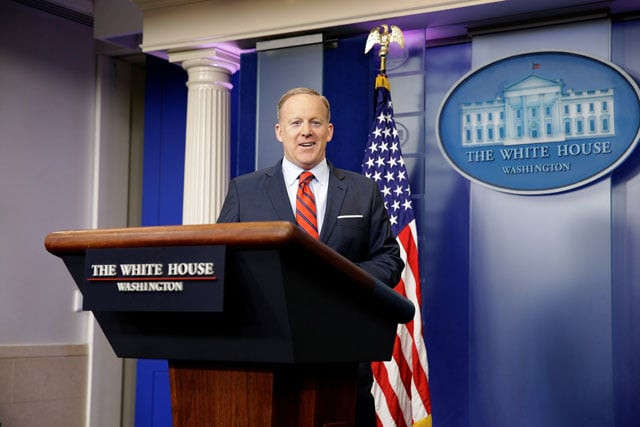 white house press secretary sean spicer arrives for a press briefing at the white house in washington us april 11 2017 photo reuters