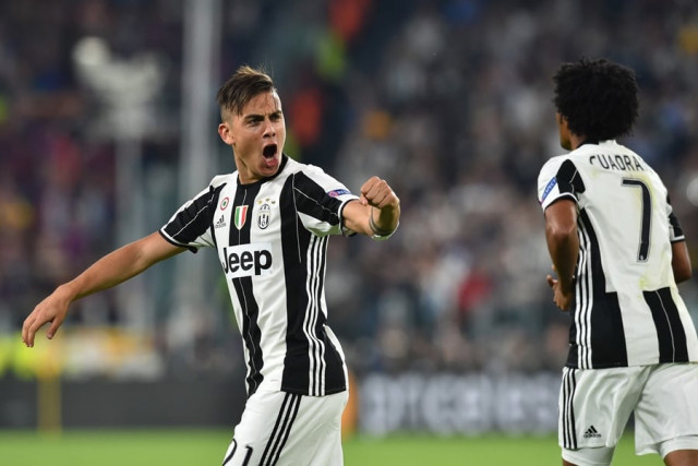 juventus 039 forward from argentina paulo dybala celebrates after scoring during the uefa champions league quarter final first leg football match juventus vs barcelona on april 11 2017 at the juventus stadium in turin photo afp juventus 039 forward from argentina paulo dybala celebrates after scoring during the uefa champions league quarter final first leg football match juventus vs barcelona on april 11 2017 at the juventus stadium in turin photo afp