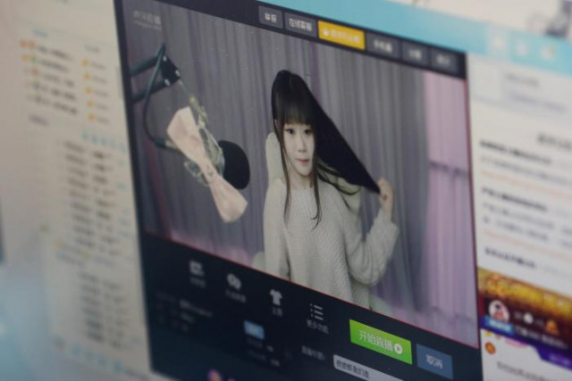 a girl broadcasts at three minute tv a live streaming talent agency in beijing china february 15 2017 picture taken february 15 2017 photo reuters a girl broadcasts at three minute tv a live streaming talent agency in beijing china february 15 2017 picture taken february 15 2017 photo reuters