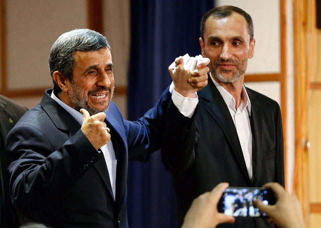 former iranian president mahmoud ahmadinejad c stands with former iranian vice president hamid baghaei r after registering at the interior ministry 039 s election headquarters as candidates begin to sign up for the upcoming presidential elections in tehran on april 12 2017 photo afp