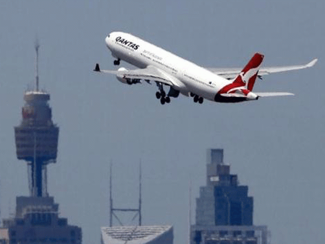 a qantas airways airbus a330 300 jet takes off from sydney international airport over the city skyline december 18 2015 photo reuters a qantas airways airbus a330 300 jet takes off from sydney international airport over the city skyline december 18 2015 photo reuters