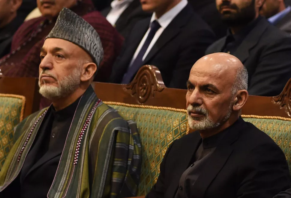 in this file photo afghan president ashraf ghani right and former president hamid karzai attend a ceremony marking the first anniversary of the death of former vice president mohammad qasim fahim in kabul on march 9 2015 photo afp in this file photo afghan president ashraf ghani right and former president hamid karzai attend a ceremony marking the first anniversary of the death of former vice president mohammad qasim fahim in kabul on march 9 2015 photo afp